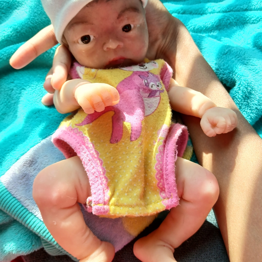 Reborn Baby Doll in Yellow and Pink Outfit